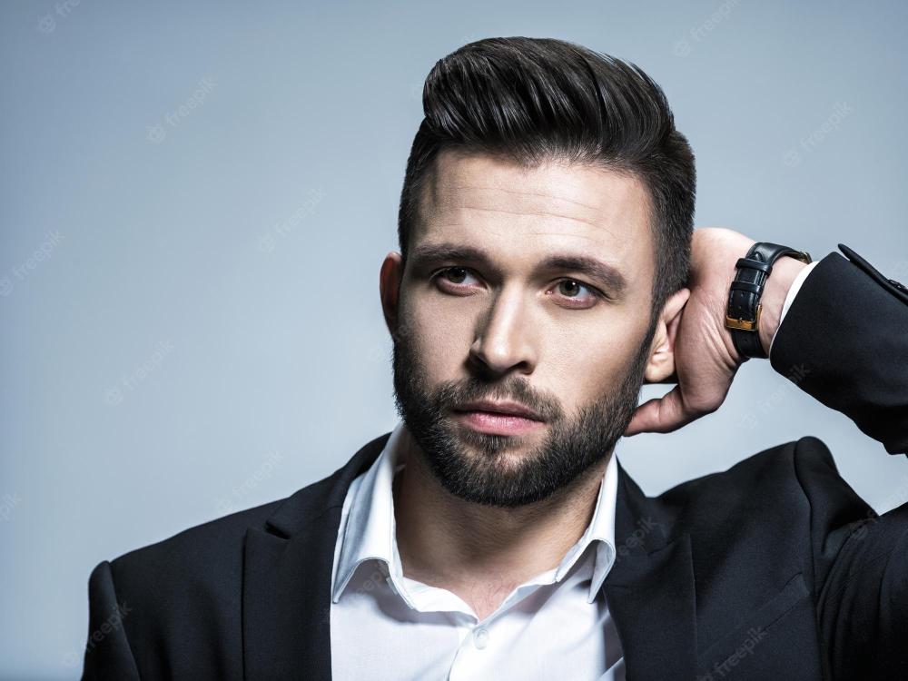 handsome-man-black-suit-with-white-shirt-posing-attractive-guy-with-fashion-hairstyle-confident-man-with-short-beard-adult-boy-with-brown-hair_186202-8526.jpg